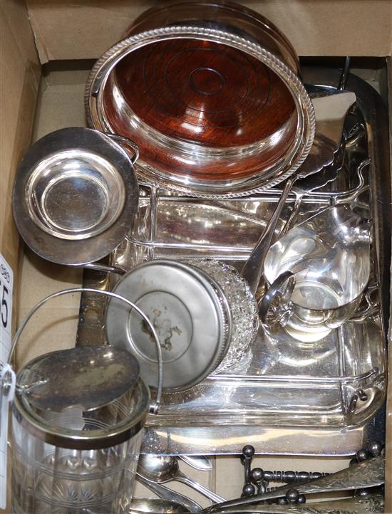 A plated serving dish and other plated wares